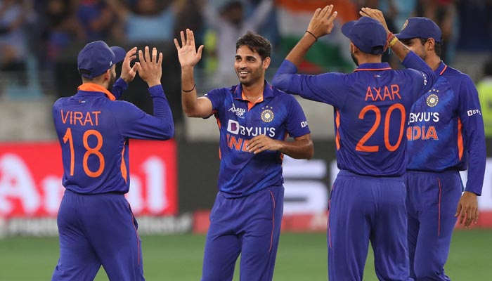 Indias Bhuvneshwar Kumar (2L) celebrates with teammates after bowling out Afghanistans Rahmanullah Gurbaz (not pictured) during the Asia Cup Twenty20 international cricket Super Four match between Afghanistan and India at the Dubai International Cricket Stadium in Dubai on September 8, 2022. — AFP