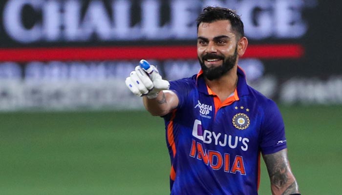 Indias Virat Kohli celebrates after scoring a century (100 runs) during the Asia Cup T20 international cricket Super Four match between Afghanistan and India at the Dubai International Cricket Stadium in Dubai on September 8, 2022. — AFP