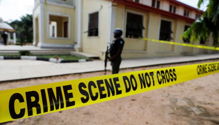 A police crime scene tape is seen in front of St. Francis Catholic Church where gunmen attacked worshippers during a Sunday mass service in Owo, Ondo, Nigeria, June 6, 2022. — Reuters