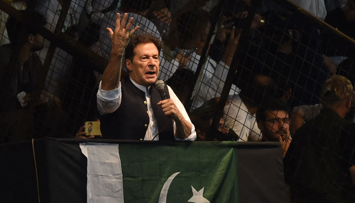 PTI Chairman Imran Khan addressing a public rally. — AFP/File