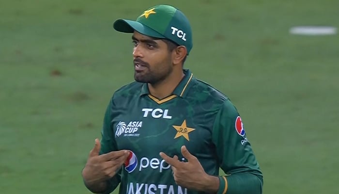 Pakistan skipper Babar Azam speaks to the umpire during Pakistan vs Sri Lanka match in Dubai, on September 09, 2022. — Twitter/CricCrazyJohns