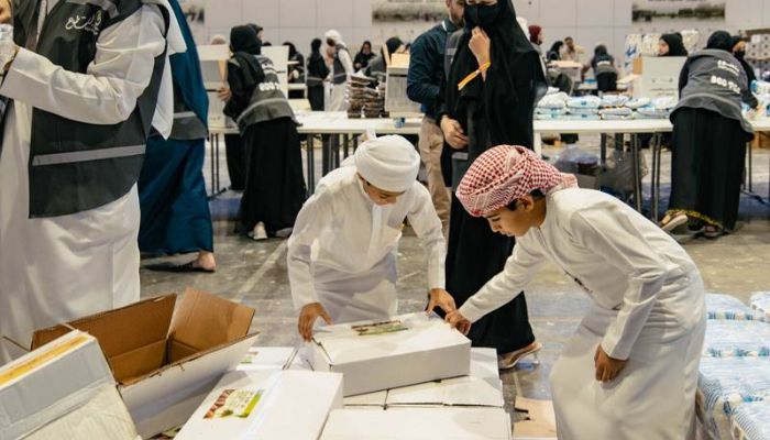 The ‘We Stand Together’ community event also gave children an opportunity to write and draw positive messages to be placed inside the relief boxes. — The National