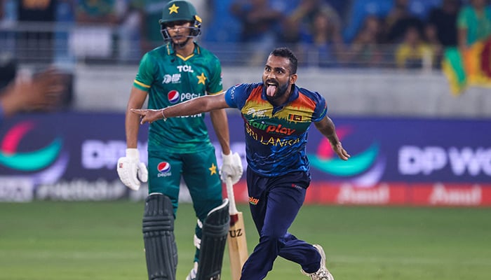 Sri Lankas Pramod Madushan (R) celebrates after dismissing the last Pakistans wicket to win the Asia Cup Twenty20 international cricket final match between Pakistan and Sri Lanka at the Dubai International Cricket Stadium in Dubai on September 11, 2022. — AFP