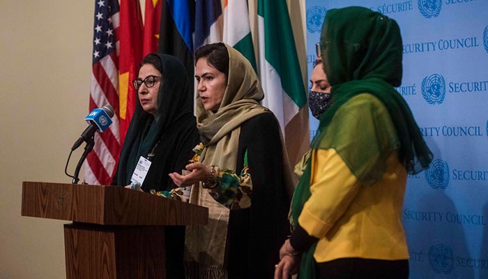 Afghan women leaders and human rights defenders speak to press outside of the UN Security Council chambers on 21 October 2021. — UN Women