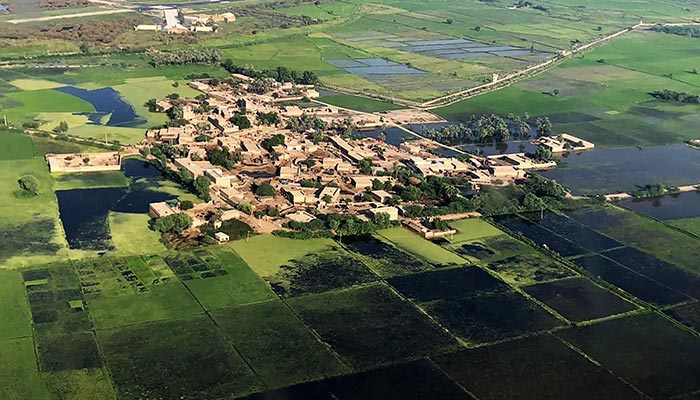 This aerial picture shows a flooded area on the outskirts of Sukkur, Sindh province, on September 10, 2022. — AFP