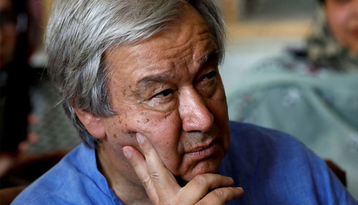 UN Secretary-General Antonio Guterres listens to first response health workers during a presentation, following rains and floods during the monsoon season in Larkana, Pakistan September 10, 2022.