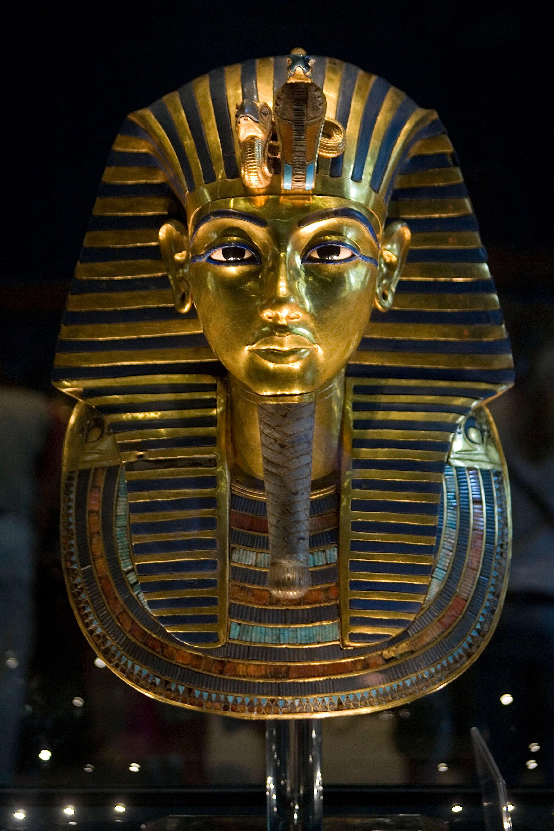 This file picture taken on October 20, 2009 shows a view of the gold burial mask of the ancient Egyptian Pharaoh Tutankhamun (reigned between 1342-1325 BC) on display at the Egyptian museum in Egypt´s capital Cairo. Ahead of the bicentenary of the deciphering of the Rosetta Stone -- which unlocked the key to reading ancient hieroglyphs -- and the 100th anniversary of Carter´s earth-shattering discovery, Egyptians are demanding that their contributions to the discoveries be recognised and artefacts abroad returned.