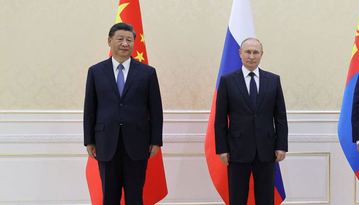Chinese President Xi Jinping, Russian President Vladimir Putin and Mongolian President Ukhnaa Khurelsukh pose for a picture during a meeting on the sidelines of the Shanghai Cooperation Organisation (SCO) summit in Samarkand, Uzbekistan September 15, 2022. — Reuters