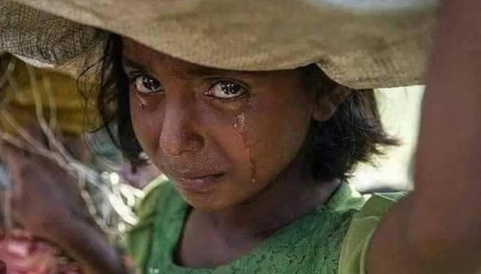 Picture of a girl taken at Myanmar-Bangladesh border years before the record floods hit Pakistan. — Instagram