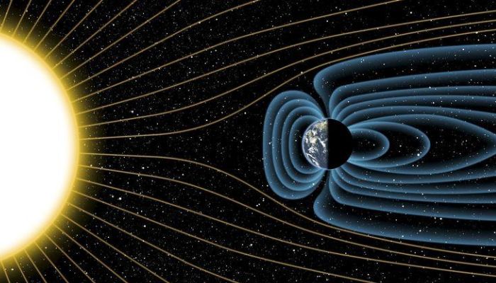 An artists depiction of Earths magnetic field deflecting high-energy protons from the sun four billion years ago, is shown in this image released on July 30, 2015. — Reuters