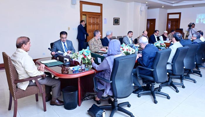 Prime Minister Shehbaz Sharif chairs a meeting to review flood situation in the country and ongoing rescue and relief operations in flood affected areas. — PID