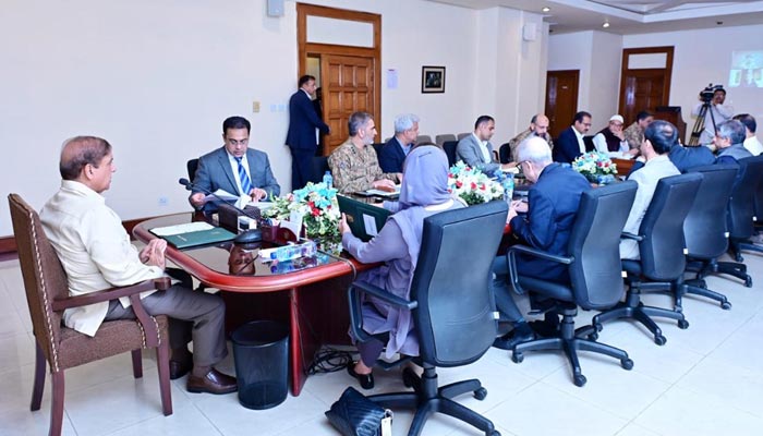 Prime Minister Shehbaz Sharif chairs a meeting to review flood situation in the country and ongoingrescue and relief operations in flood affected areas. — PID