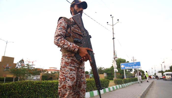 A representational image of a rangers personnel standing outside National Stadium Karachi. — INP/File