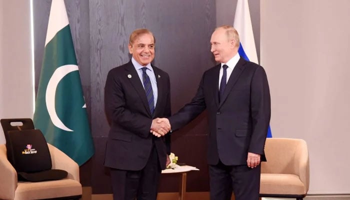 Prime Minister Shahbaz Sharif with Russian President Vladimir Putin. — PM Office