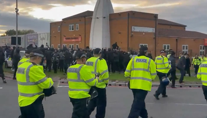 Screengrab from a Twitter video of police trying to take control of situation after a protest in Birmingham.