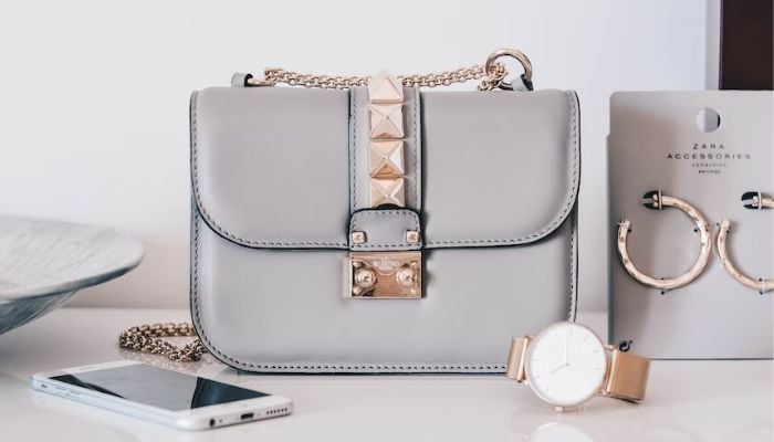 Grey leather bag.— Unsplash