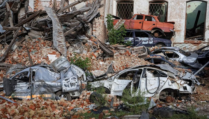 Destroyed cars are seen, as Russias attack on Ukraine continues, in the town of Izium, recently liberated by Ukrainian Armed Forces, in Kharkiv region, Ukraine September 20, 2022. — Reuters