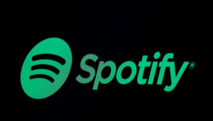 The Spotify logo is displayed on a screen on the floor of the New York Stock Exchange (NYSE) in New York, U.S., May 3, 2018. — Reuters