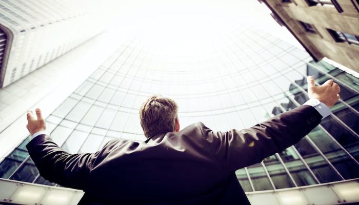 A man in front of a building.— Unsplash