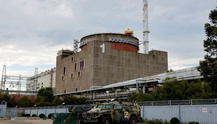 A Russian all-terrain armoured vehicle is parked outside the Zaporizhzhia Nuclear Power Plant during the visit of the International Atomic Energy Agency (IAEA) expert mission in the course of Ukraine-Russia conflict outside Enerhodar in the Zaporizhzhia region, Ukraine, September 1, 2022. — Reuters