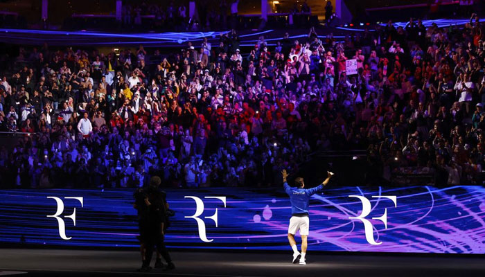 Team Europes Roger Federer applauds fans at the end of his last match after announcing his retirement on September 24, 2022. — Reuters