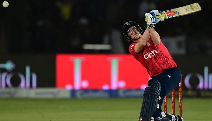 Englands Harry Brook plays a shot during the third Twenty20 international cricket match between Pakistan and England at the National Cricket Stadium in Karachi on September 23, 2022. — AFP