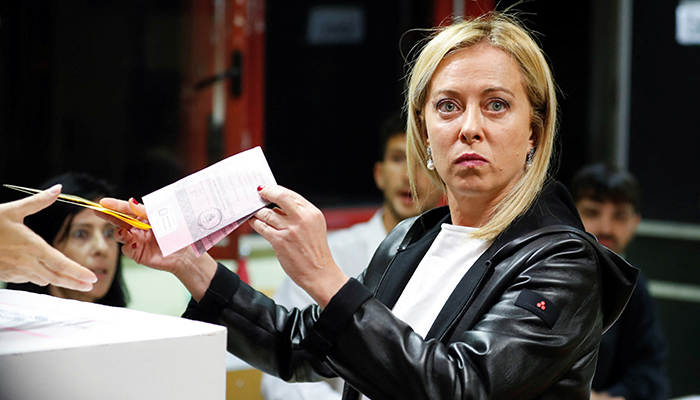 Leader of Brothers of Italy Giorgia Meloni votes at a polling station during the snap election in Rome, Italy September 25, 2022. — Reuters