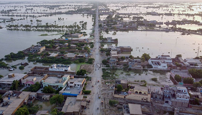 An aerial view shows a flooded residential area after heavy monsoon rains in Balochistan province, Pakistan, on August 29, 2022. — AFP