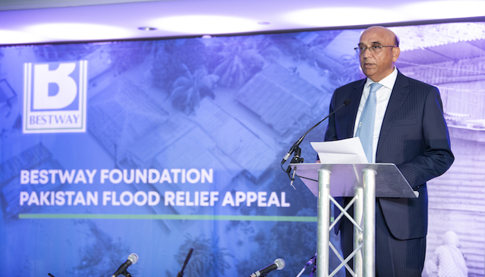 Bestway CEO Lord Zameer Choudrey addresses a fundraiser for Pakistans flood victims held at Intercontinental Park Lane in London. — Courtesy our correspondent