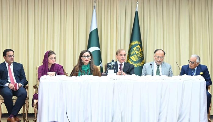 Prime Minister Shehbaz Sharif addresses a press conference at the Prime Minister House along with Climate Change Minister Sherry Minister, Information Minister Marriyum Aurangzeb and Planning Minister Ahsan Iqbal. — PID