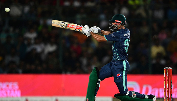 Pakistan´s Shan Masood plays a shot during the fourth Twenty20 international cricket match between Pakistan and England at the National Cricket Stadium in Karachi on September 25, 2022. — AFP