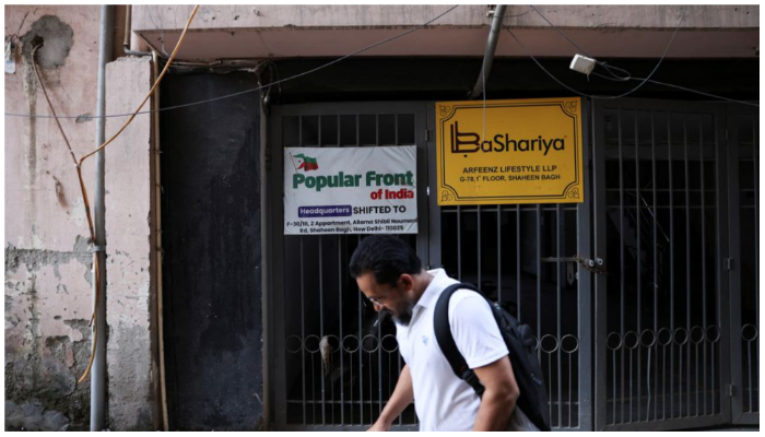 A man walks past the old office of Popular Front of India (PFI) Islamic group, in New Delhi, India, September 28, 2022. — Reuters /Anushree Fadnavis