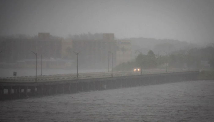 A car is seen on Caloosahatchee Bridge ahead of Hurricane Ian, in Fort Myers, Florida, US September 28, 2022. — Reuters