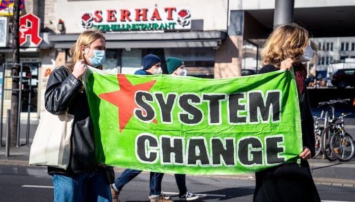 Climate activists on the street. — Unsplash