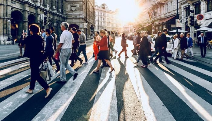 People walking on the road. — Unsplash