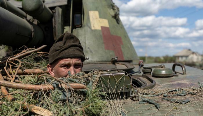 An Ukrainian soldier looks out from a tank, amid Russias invasion of Ukraine, in the frontline city of Lyman, Donetsk region, Ukraine April 28, 2022. — Reuters