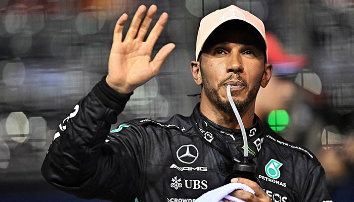 Mercedes´ British driver Lewis Hamilton reacts after placing third in the qualifying session ahead of the Formula One Singapore Grand Prix night race at the Marina Bay Street Circuit in Singapore on October 1, 2022. — AFP