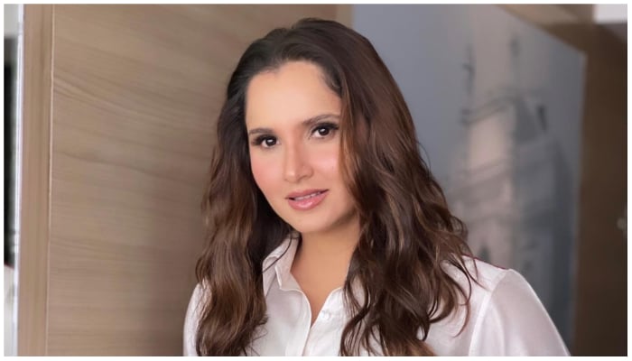 Indian tennis sensation Sania Mirza poses in a white satin shirt. — Instagram/mirzasaniar