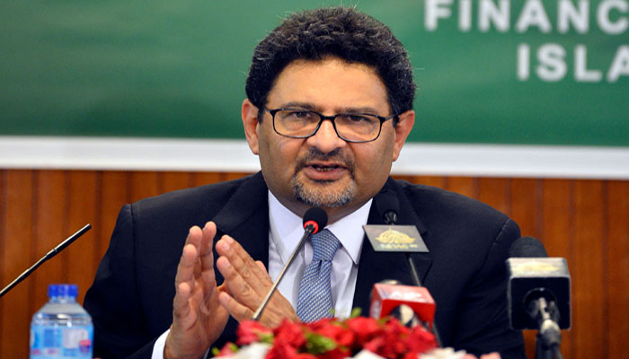 Former finance minister Miftah Ismail addressing a press conference. — AFP/File