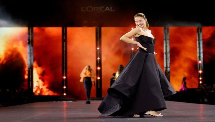 L’Oreal Paris hosts exuberant catwalk presentation at fashion week