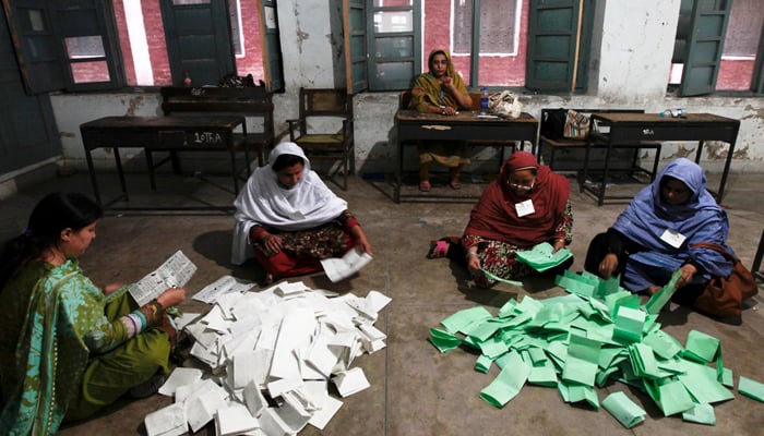 Officials counting votes after elections. — Reuters/File