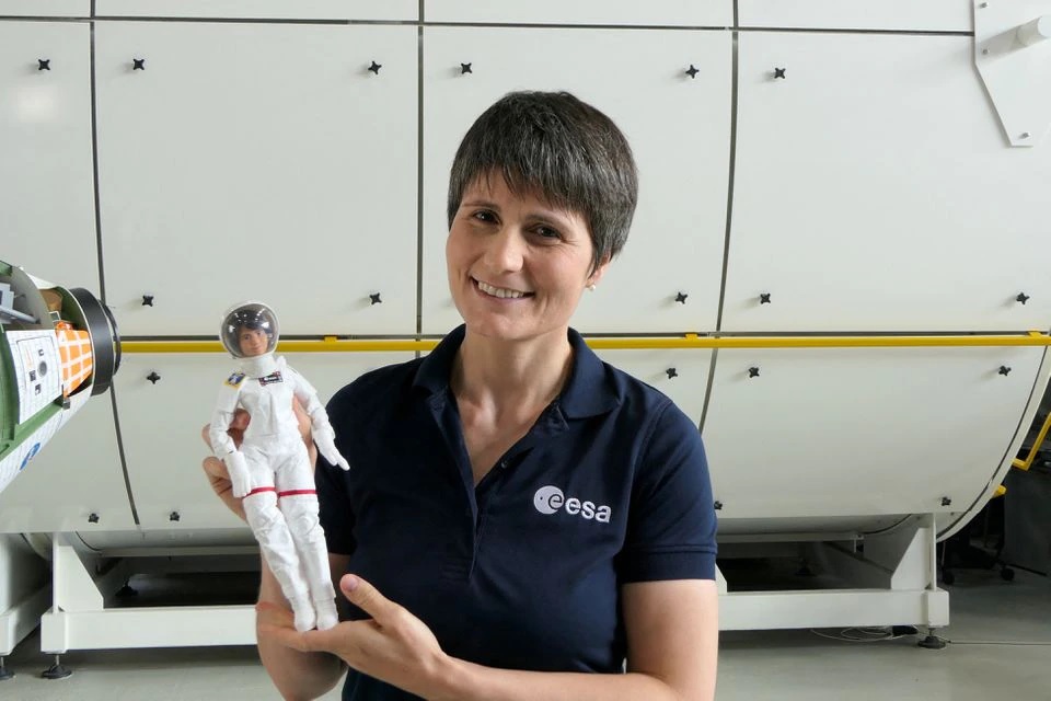 A handout photo from 2021 shows Europes first female commander of the ISS, ESA astronaut Samantha Cristoforetti with her lookalike Barbie during parabolic training for the 2022 mission to the International Space Station (ISS), in Cologne, Germany. — Reuters