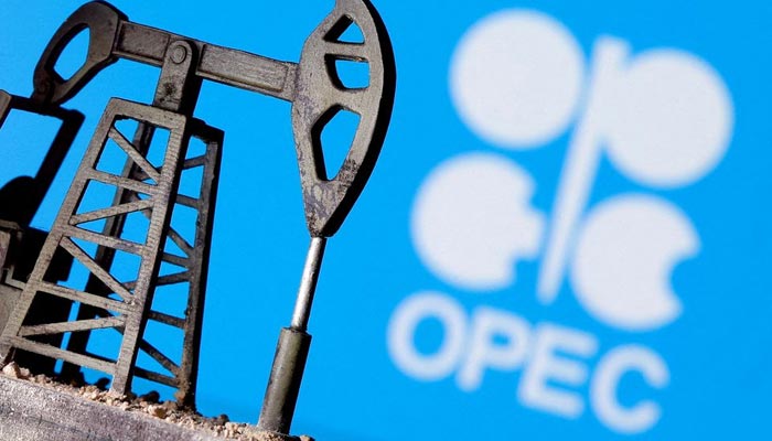 A 3D printed oil pump jack is seen in front of displayed OPEC logo in this illustration picture, April 14, 2020. — Reuters/File