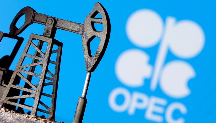 A 3D-printed oil pump jack is seen in front of displayed OPEC logo in this illustration picture, April 14, 2020. —  Reuters