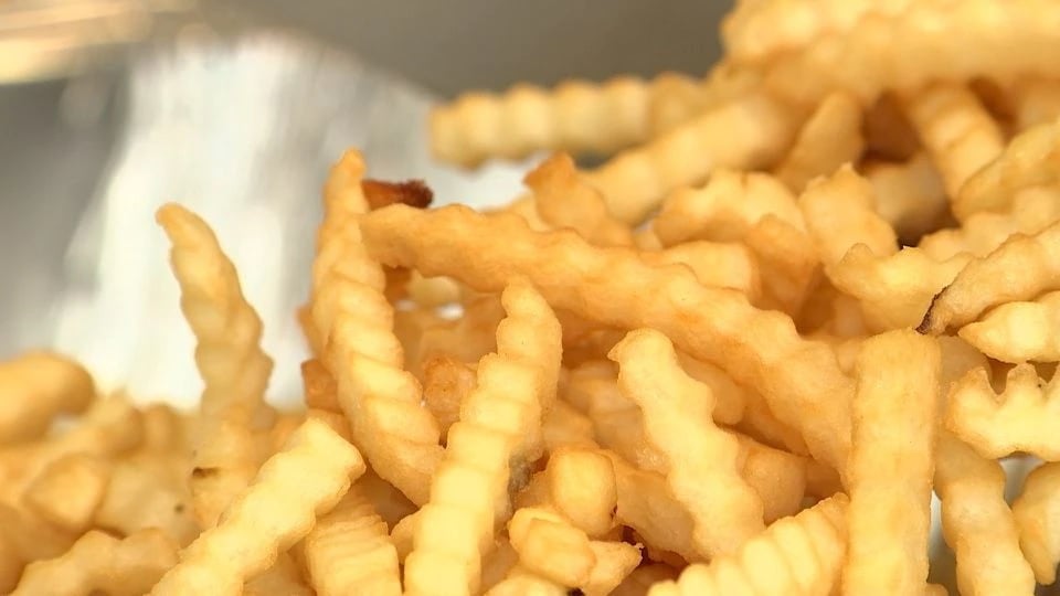 Fries prepared by the Flippy 2 robot are seen at a lab of manufacturer Miso Robotics Inc in Pasadena, California, U.S. September 27, 2022 in this screen grab from a REUTERS video.