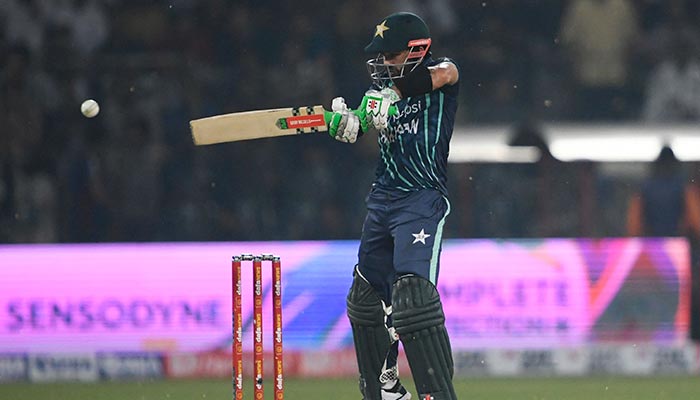 Pakistans wicketkeeper Mohammad Rizwan plays a shot during the fifth Twenty20 international cricket match between Pakistan and England at the Gaddafi Cricket Stadium in Lahore on September 28, 2022. — AFP