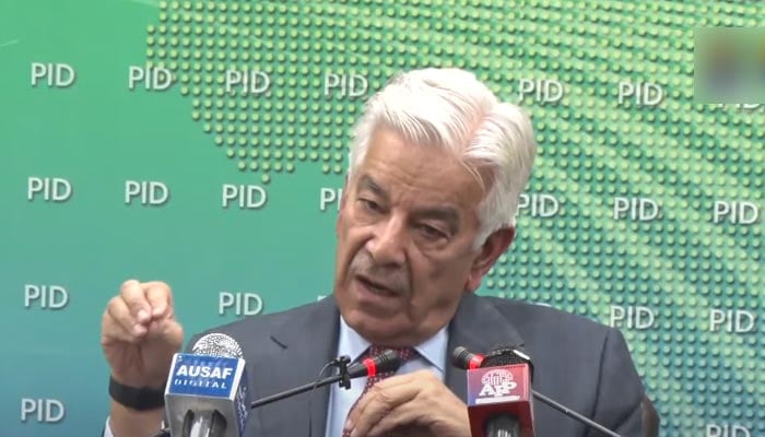 Defence Minister Khawaja Muhammad Asif addresses a press conference in Islamabad on October 9, 2022. — YouTube/PTVNewsLive