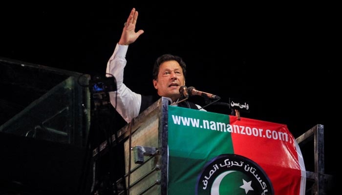 Ousted prime minister Imran Khan gestures as he addresses supporters during a rally, in Lahore, Pakistan April 21, 2022. — Reuters