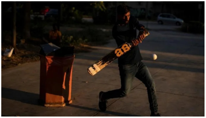 Representational image of a person playing tape-ball cricket. — Reuters