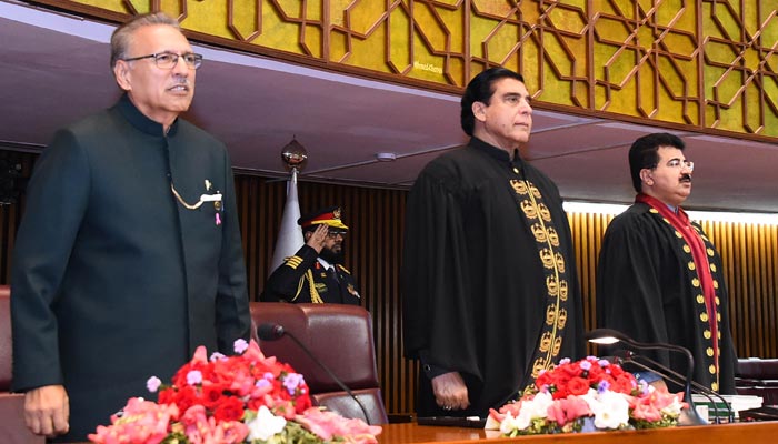 (L-R) President Dr Arif Alvi, Speaker National Assembly Raja Pervaiz Ashraf and Senate Chairman Sadiq Sanjrani listening to National Anthem before the president address to the joint session of the Parliament. — PID